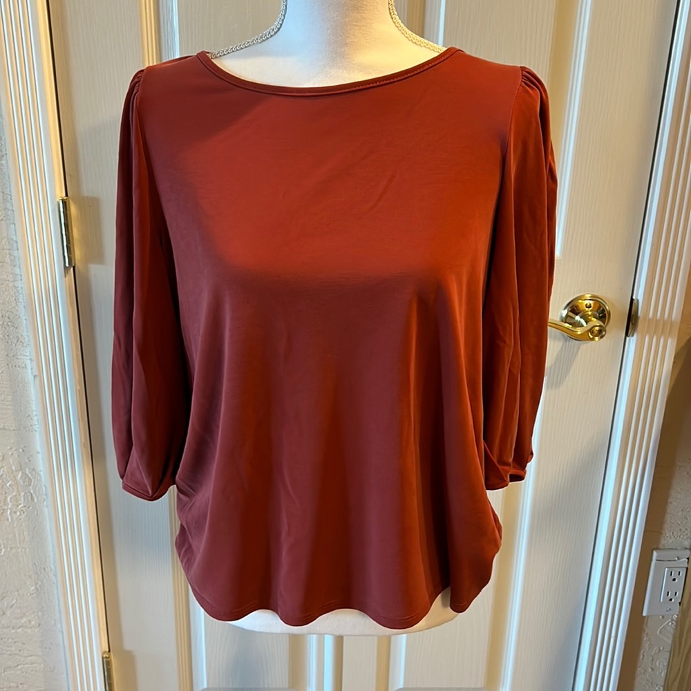 Green envelope rust colored top
